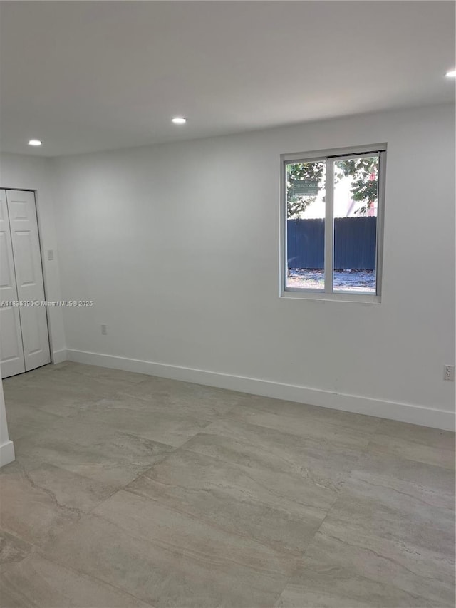 1310 Sharazad Blvd, Opa Locka, FL 33054 - unfurnished room with baseboards and recessed lighting