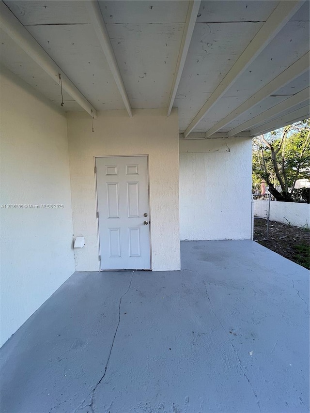 1310 Sharazad Blvd, Opa Locka, FL 33054 - entrance to property featuring a patio area and stucco siding