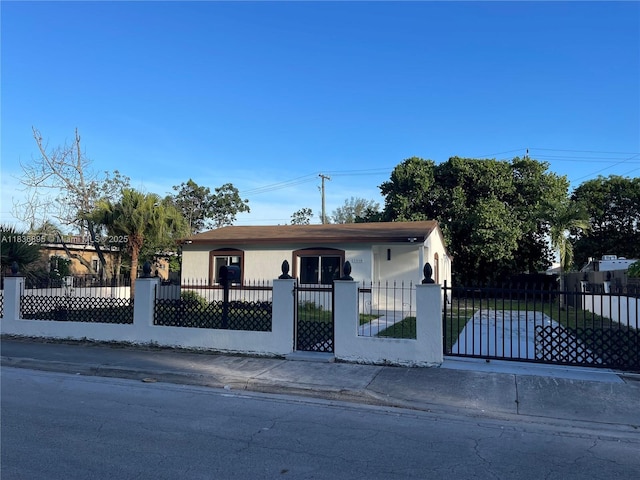 1310 Sharazad Blvd, Opa Locka, FL 33054 - bungalow-style house featuring a fenced front yard