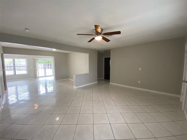 7521 Indigo St, Miramar, FL 33023 - empty room with light tile patterned floors and ceiling fan