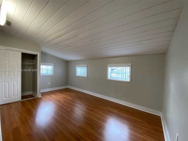 7521 Indigo St, Miramar, FL 33023 - unfurnished bedroom with lofted ceiling, wood finished floors, and a closet