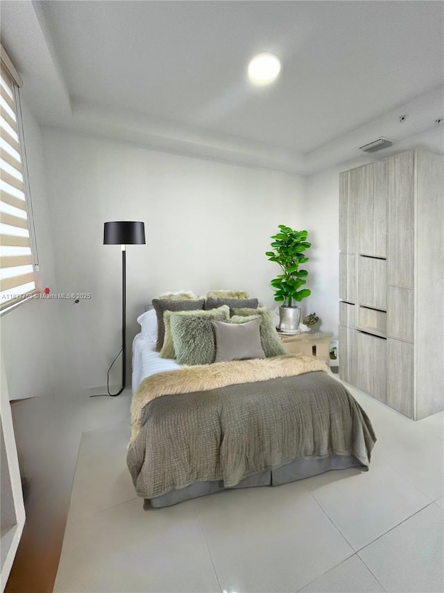 2651 NE 212th Ter Unit 202, Aventura, FL 33180 - tiled bedroom with a tray ceiling