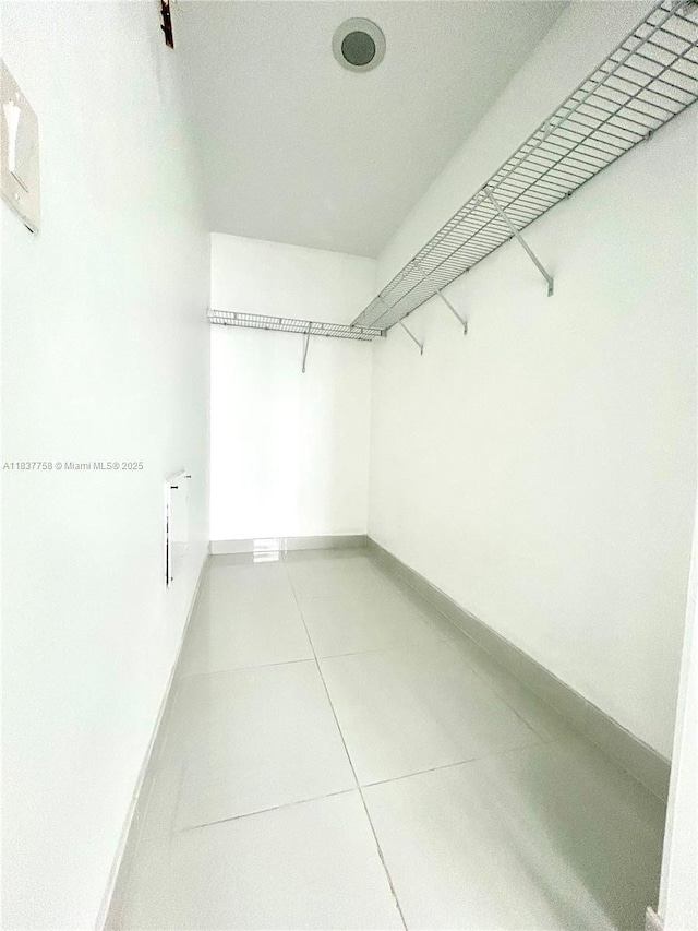 2651 NE 212th Ter Unit 202, Aventura, FL 33180 - spacious closet with light tile patterned flooring