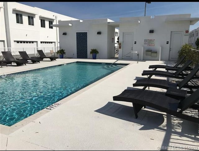 2651 NE 212th Ter Unit 202, Aventura, FL 33180 - community pool with a patio area