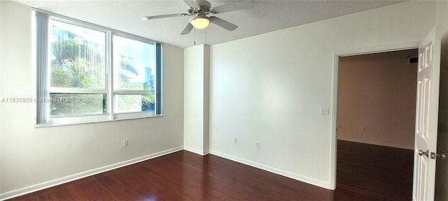 2000 N Bayshore Dr Unit 509, Miami, FL 33137 - empty room featuring dark wood-style flooring, ceiling fan, and a textured ceiling