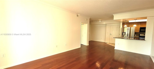 2000 N Bayshore Dr Unit 509, Miami, FL 33137 - unfurnished living room with dark wood finished floors, crown molding, and a textured ceiling