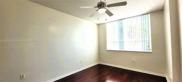 2000 N Bayshore Dr Unit 509, Miami, FL 33137 - spare room featuring dark wood-type flooring, a textured ceiling, and a ceiling fan