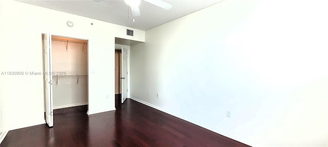 2000 N Bayshore Dr Unit 509, Miami, FL 33137 - unfurnished bedroom with dark wood-style flooring, a closet, and ceiling fan