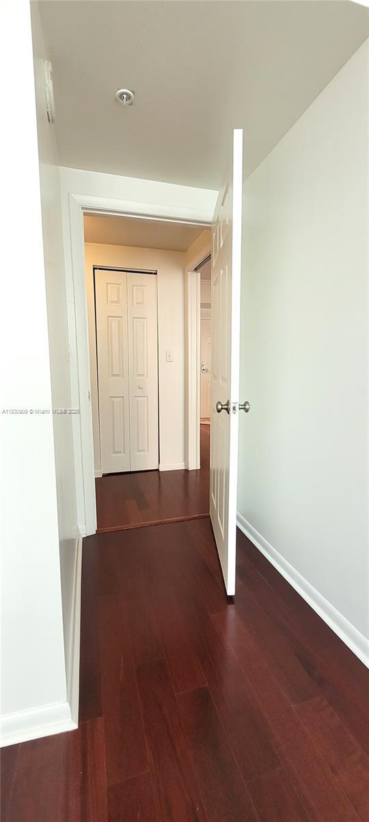 2000 N Bayshore Dr Unit 509, Miami, FL 33137 - corridor with wood finished floors and baseboards