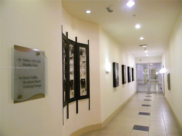2000 N Bayshore Dr Unit 509, Miami, FL 33137 - corridor featuring light tile patterned flooring, recessed lighting, and french doors