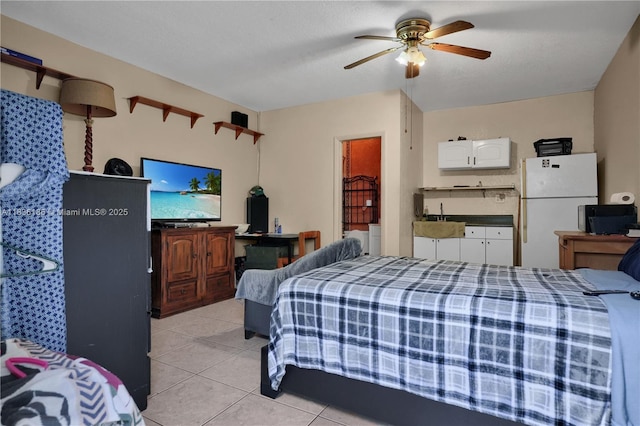 10405 SW 146th Ave, Miami, FL 33186 - bedroom with freestanding refrigerator, light tile patterned floors, and a ceiling fan