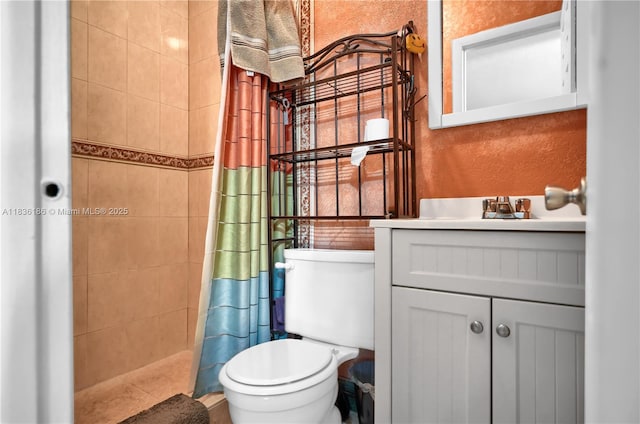 10405 SW 146th Ave, Miami, FL 33186 - bathroom featuring a tile shower, a textured wall, and vanity