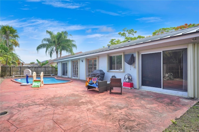 10405 SW 146th Ave, Miami, FL 33186 - view of swimming pool featuring a patio area and a fenced backyard