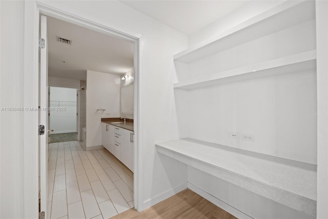 999 SW 1st Ave Unit 1615, Miami, FL 33130 - full bath with vanity and baseboards