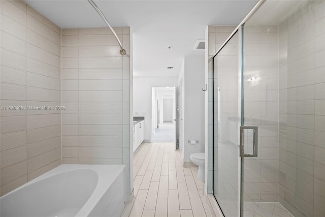 999 SW 1st Ave Unit 1615, Miami, FL 33130 - bathroom with a shower stall, a bath, and vanity