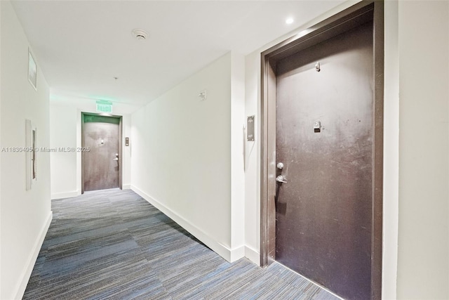 999 SW 1st Ave Unit 1615, Miami, FL 33130 - corridor with carpet and baseboards