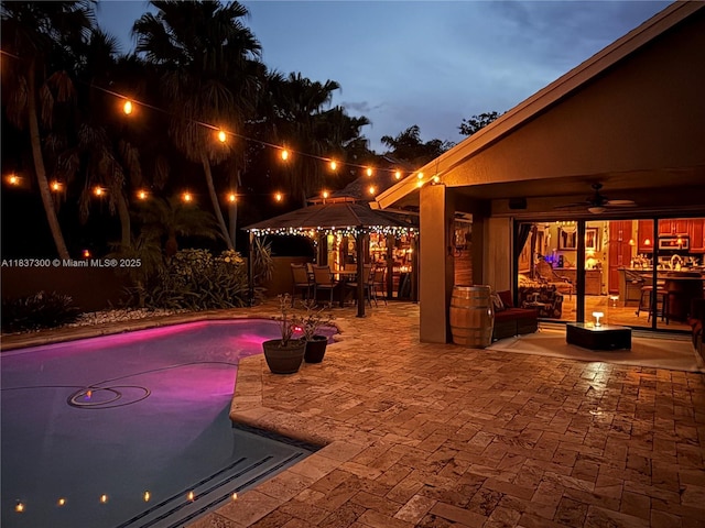 8878 SW 59th St, Cooper City, FL 33328 - outdoor pool with a gazebo, a patio area, and a ceiling fan