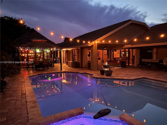 8878 SW 59th St, Cooper City, FL 33328 - outdoor pool featuring a jacuzzi, a patio, outdoor dining area, and a gazebo