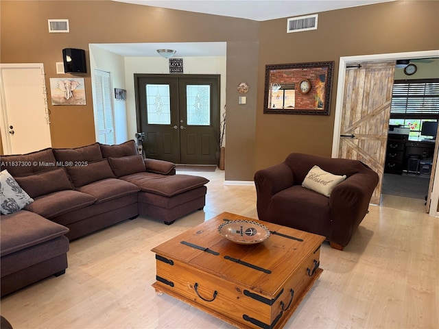 8878 SW 59th St, Cooper City, FL 33328 - living area featuring light wood-type flooring and french doors