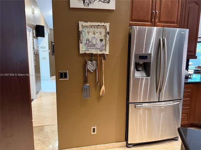 8878 SW 59th St, Cooper City, FL 33328 - kitchen with stainless steel refrigerator with ice dispenser and baseboards
