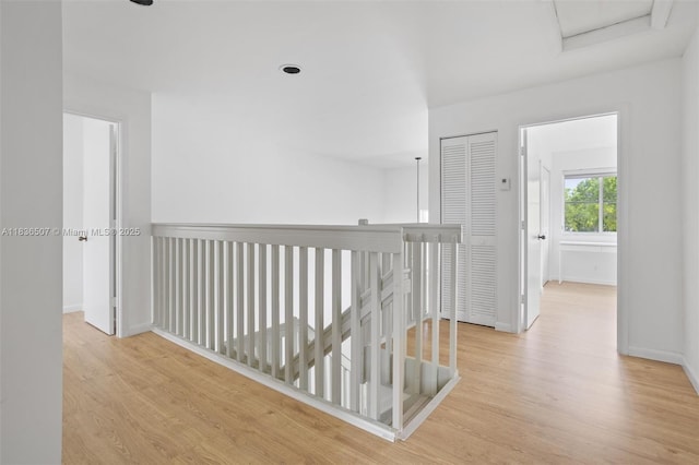 1249 Chenille Cir, Weston, FL 33327 - hallway with wood finished floors, an upstairs landing, and attic access