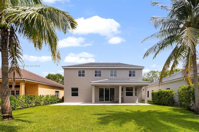 1249 Chenille Cir, Weston, FL 33327 - rear view of property featuring stucco siding, a patio, and a lawn
