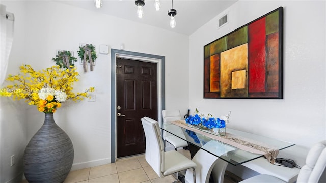 3109 NW 64th St, Miami, FL 33147 - foyer entrance featuring light tile patterned floors and baseboards