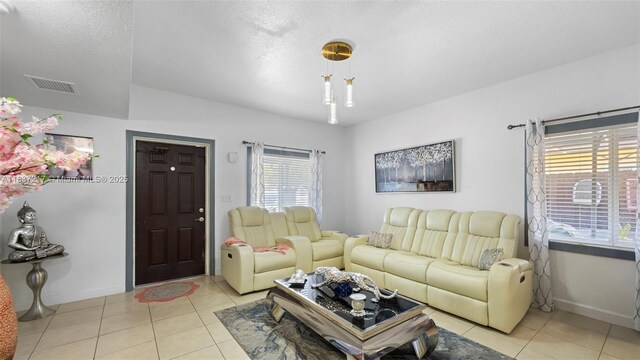 3109 NW 64th St, Miami, FL 33147 - living area with baseboards and light tile patterned flooring