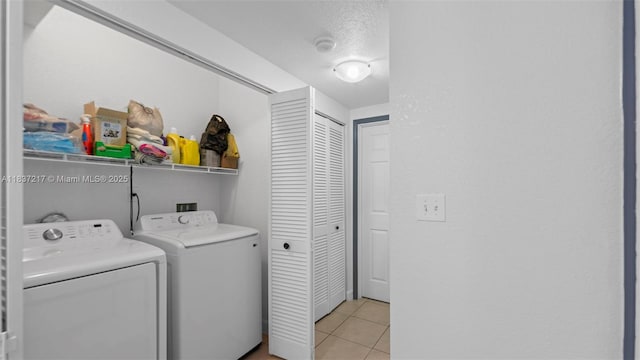 3109 NW 64th St, Miami, FL 33147 - laundry room with washing machine and clothes dryer and light tile patterned floors