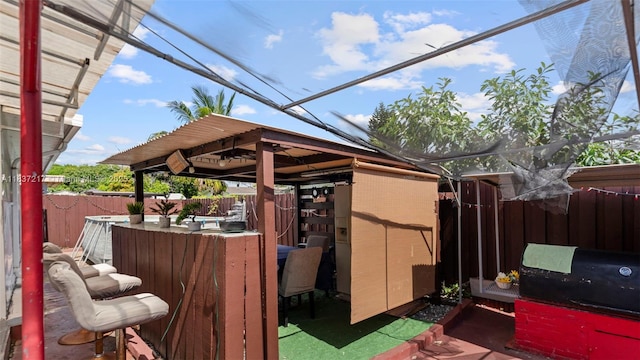 3109 NW 64th St, Miami, FL 33147 - fenced backyard featuring a shed