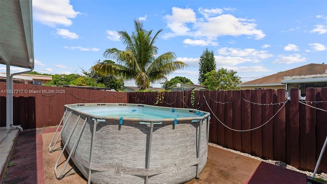 3109 NW 64th St, Miami, FL 33147 - view of swimming pool with a fenced backyard