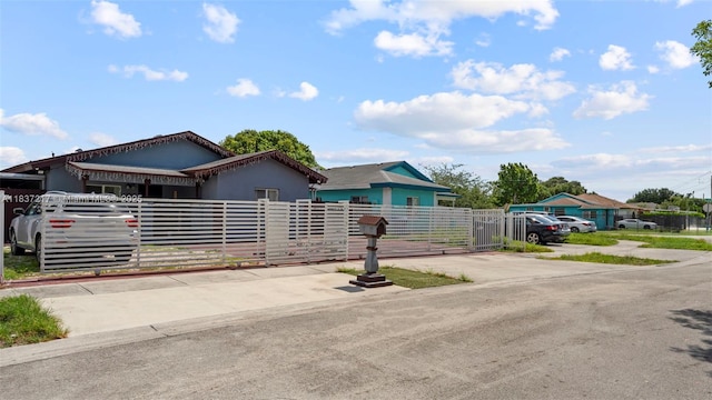 3109 NW 64th St, Miami, FL 33147 - view of front of house featuring a gate and concrete driveway