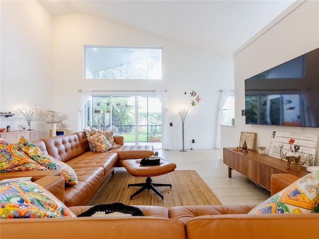 6110 Pitch Ln, Boynton Beach, FL 33437 - living area with high vaulted ceiling, healthy amount of natural light, and wood finished floors