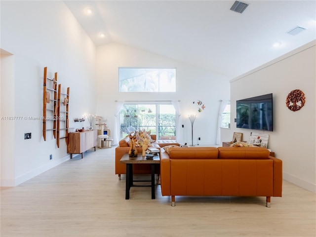 6110 Pitch Ln, Boynton Beach, FL 33437 - living room featuring high vaulted ceiling and light wood-type flooring