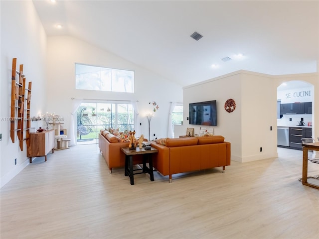 6110 Pitch Ln, Boynton Beach, FL 33437 - living room with light wood-type flooring, high vaulted ceiling, arched walkways, and recessed lighting