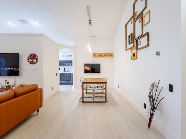 6110 Pitch Ln, Boynton Beach, FL 33437 - living area with arched walkways and light wood-type flooring