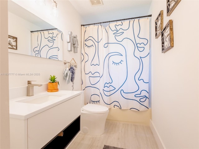 6110 Pitch Ln, Boynton Beach, FL 33437 - bathroom featuring vanity, wood finished floors, and shower / bath combination with curtain