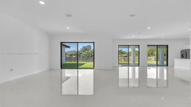 23120 SW 154th Ct, Miami, FL 33170 - tiled spare room with plenty of natural light and recessed lighting