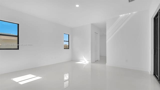 23120 SW 154th Ct, Miami, FL 33170 - empty room with plenty of natural light and recessed lighting