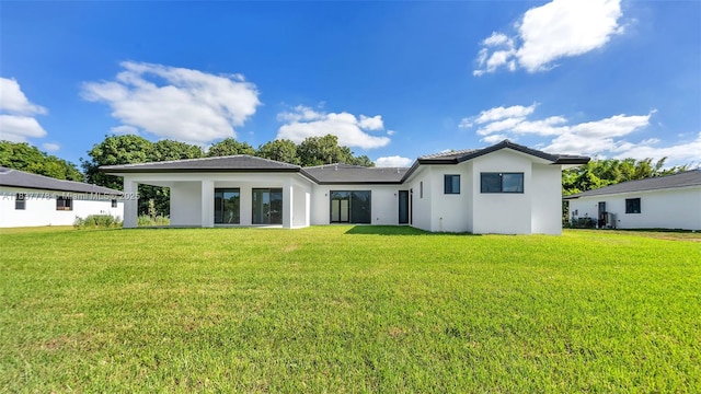23120 SW 154th Ct, Miami, FL 33170 - rear view of house with a yard and stucco siding