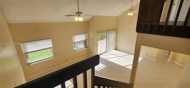 2957 Oak Park Cir, Davie, FL 33328 - tiled spare room featuring a ceiling fan, lofted ceiling, and a textured ceiling