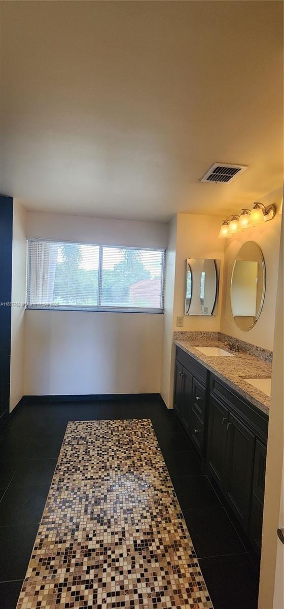 2957 Oak Park Cir, Davie, FL 33328 - full bathroom with double vanity and tile patterned flooring