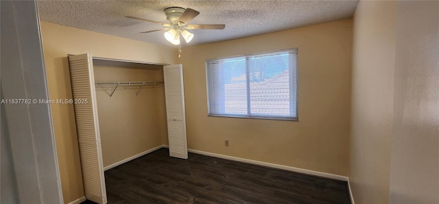 2957 Oak Park Cir, Davie, FL 33328 - unfurnished bedroom with dark wood-style floors, a closet, a textured ceiling, and ceiling fan