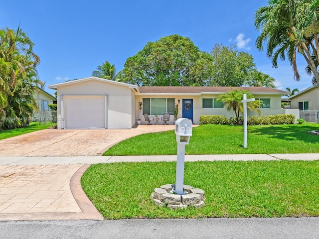 321 NW 93rd Ave, Pembroke Pines, FL 33024 - ranch-style home featuring a garage, decorative driveway, and stucco siding
