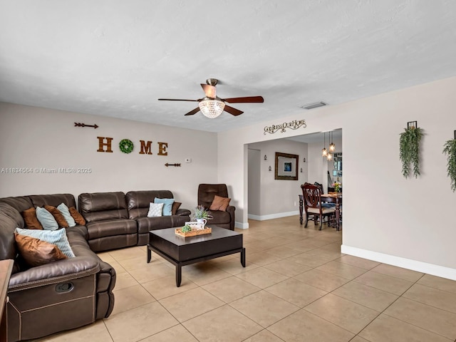 321 NW 93rd Ave, Pembroke Pines, FL 33024 - living room with light tile patterned floors, a ceiling fan, and a chandelier