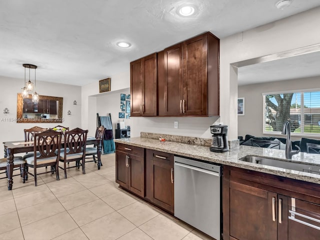 321 NW 93rd Ave, Pembroke Pines, FL 33024 - kitchen featuring stainless steel dishwasher, light stone countertops, light tile patterned floors, dark brown cabinets, and pendant lighting