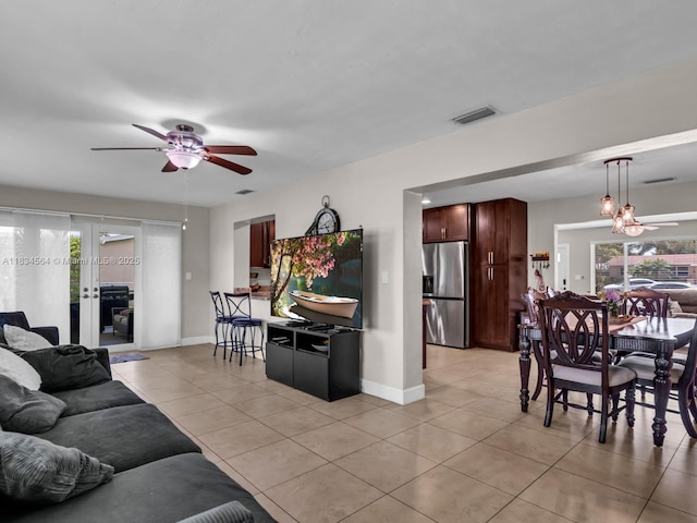 321 NW 93rd Ave, Pembroke Pines, FL 33024 - living room featuring ceiling fan, light tile patterned floors, and french doors