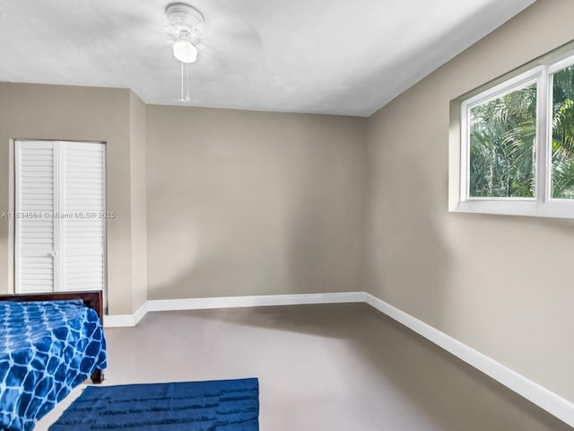 321 NW 93rd Ave, Pembroke Pines, FL 33024 - bedroom featuring ceiling fan and concrete floors