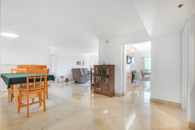1201 S Ocean Dr Unit 410S, Hollywood, FL 33019 - hallway with light marble finish floors and baseboards