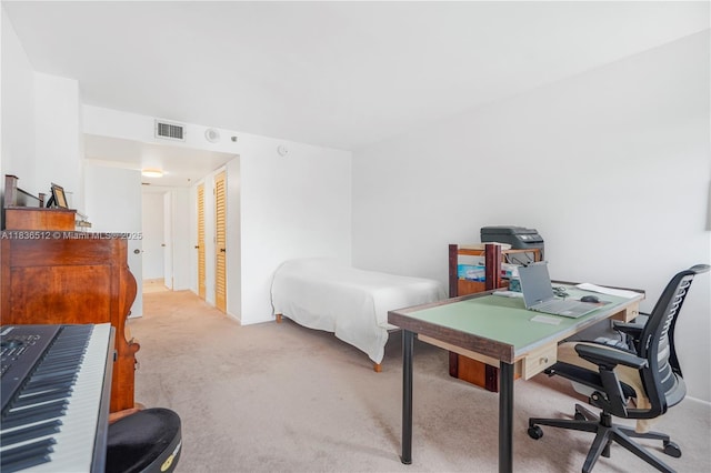 1201 S Ocean Dr Unit 410S, Hollywood, FL 33019 - bedroom featuring light colored carpet and a desk